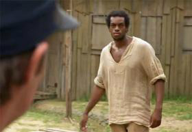 Foto: Reprodução/TV GloboO ator Vinícius Romão de Souza, em participação na novela Lado a Lado