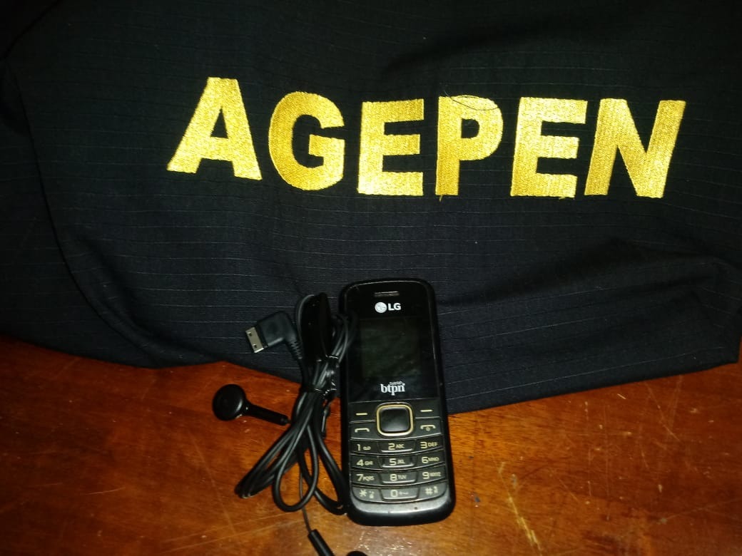 Celular arremessado. Foto: Agepen