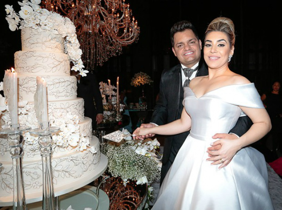 Naiara e o marido.