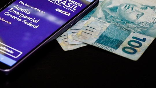 Para os beneficiários do Bolsa Família a próxima parcela do auxílio, a segunda de R$ 300, será paga a partir de 19 de outubro. Foto: G1.
