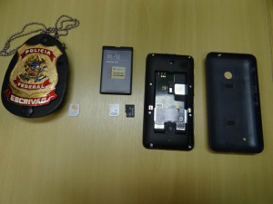 Celular de preso armazenava imagens de pornografia infantil. (Foto: Campo Grande News)