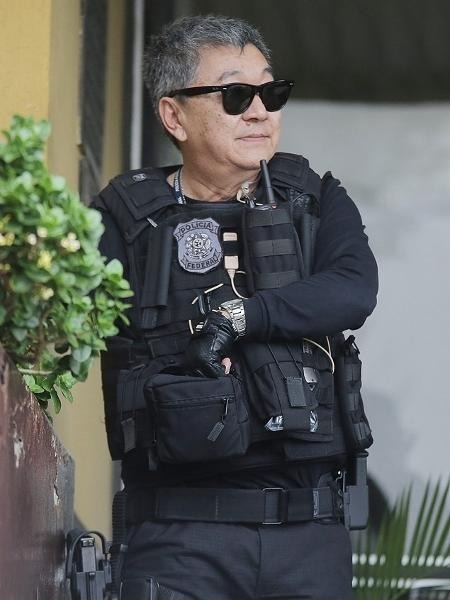 O agente federal Newton Ishii, conhecido como Japonês da FederalImagem: Giuliano Gomes/Folhapress